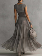 Conjunto Elena: Top con paneles de encaje y Falda Maxi Plisada