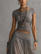 Conjunto Elena: Top con paneles de encaje y Falda Maxi Plisada